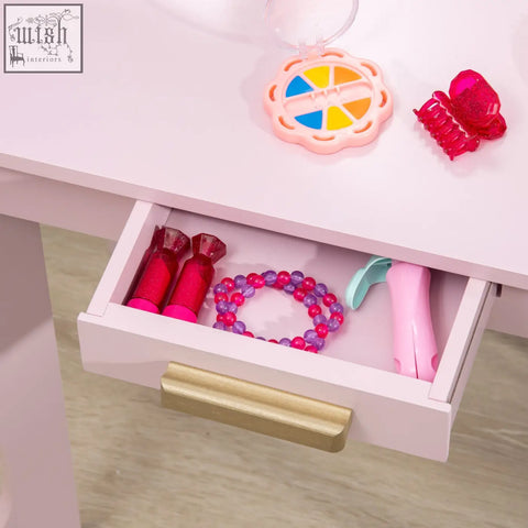 Pink plastic kids vanity table drawer with gold handle open showing toy accessories from HOMCOM dressing set