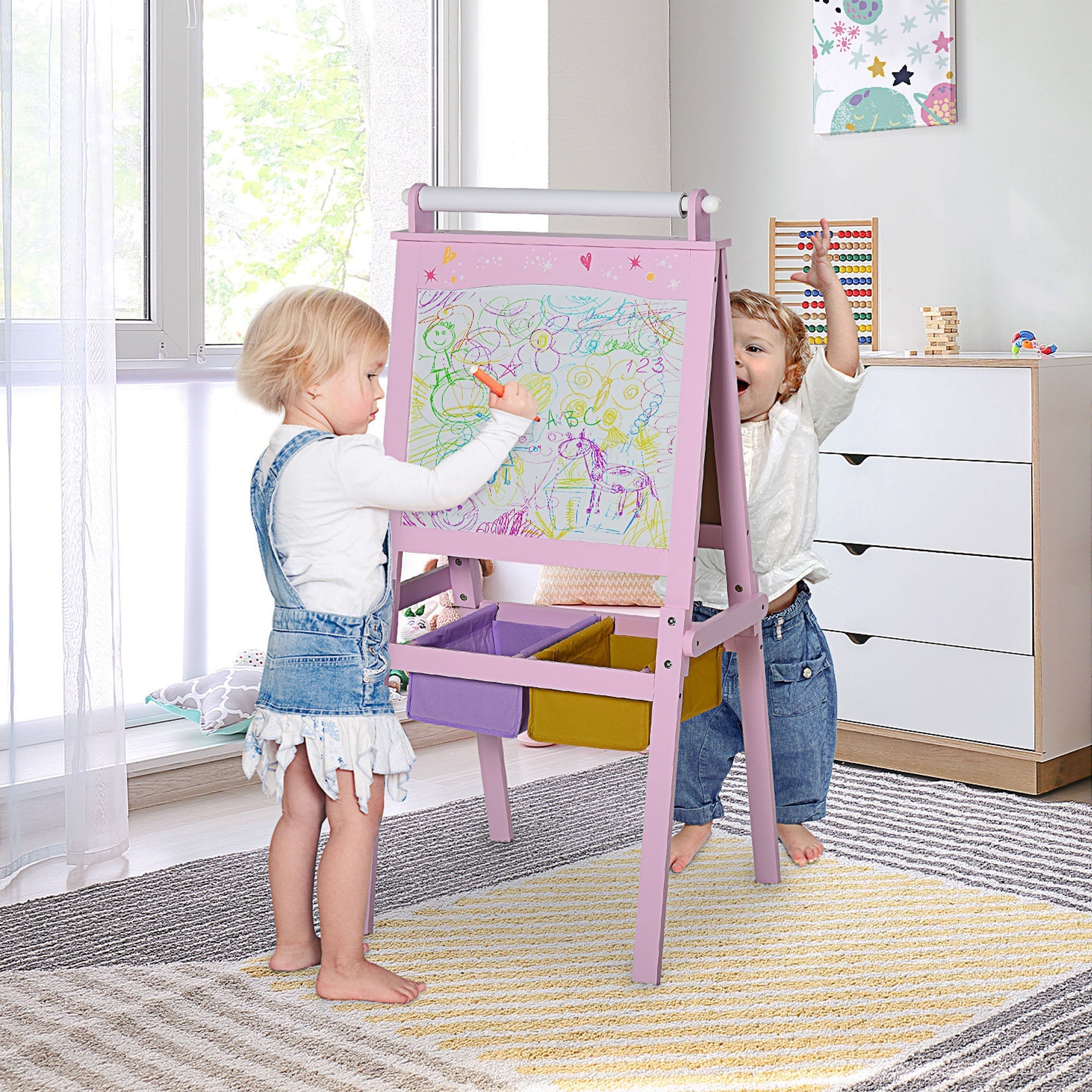 Pink wooden homcom kids easel with double-sided chalkboard whiteboard storage baskets and paper roll for drawing paper