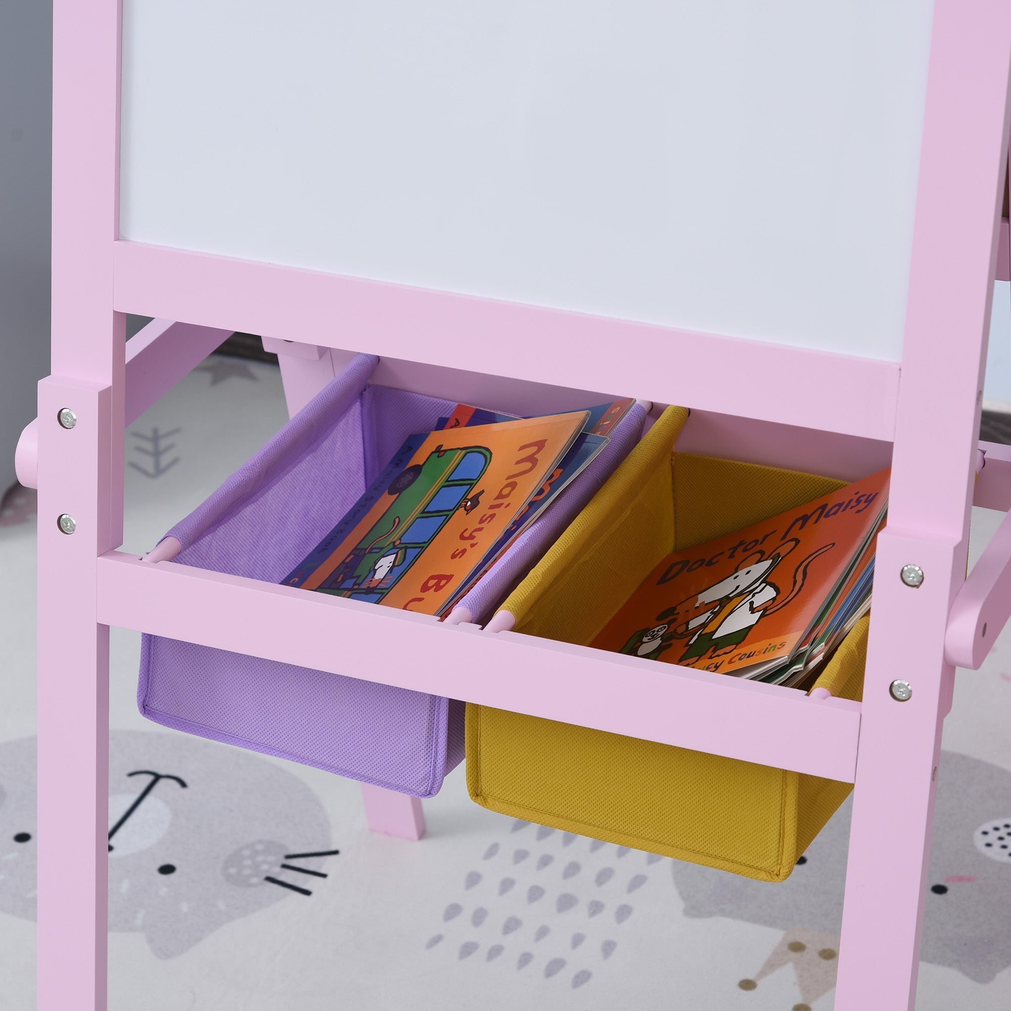 Pink wooden kids easel with whiteboard double-sided chalkboard paper roll and colorful storage baskets for drawing paper