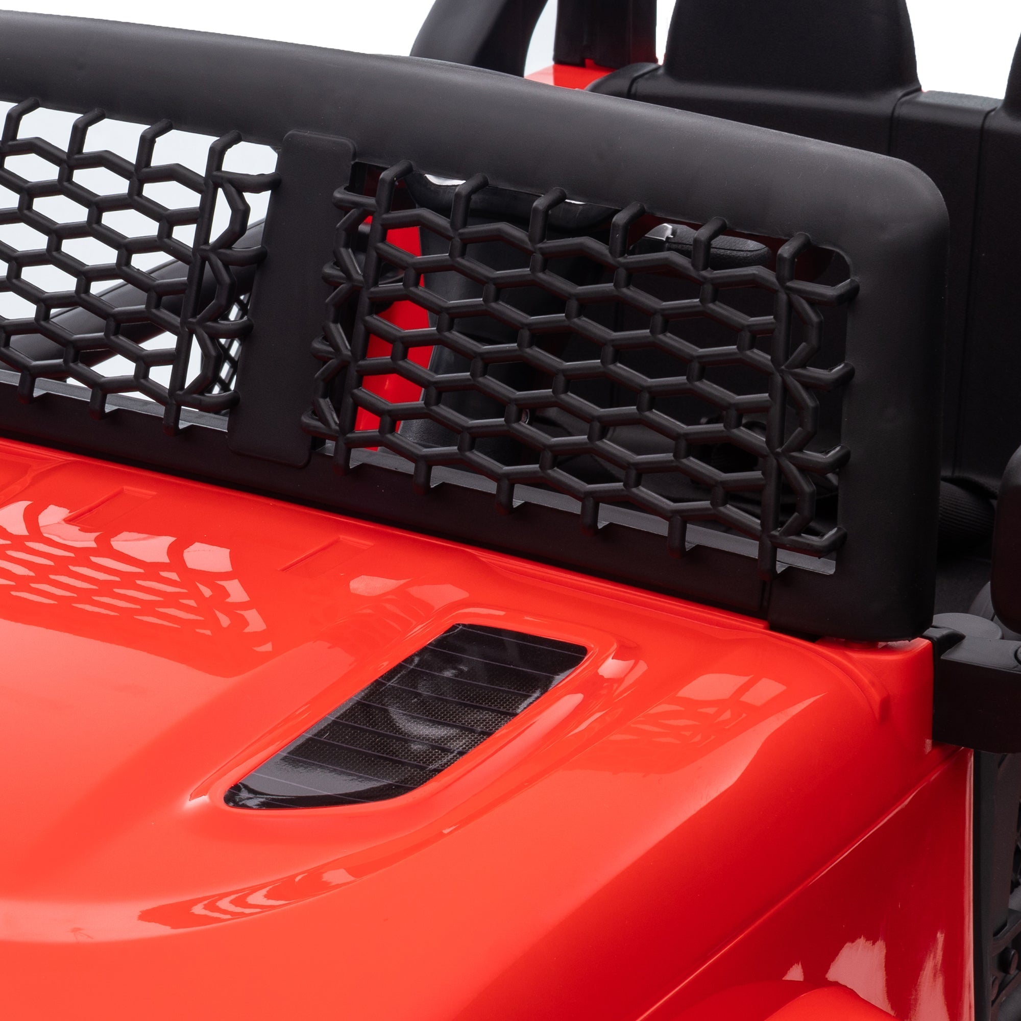 Bright red homcom kids electric ride on jeep with black mesh grille carbon fiber vent extra-wide tyres seat belt and remote control