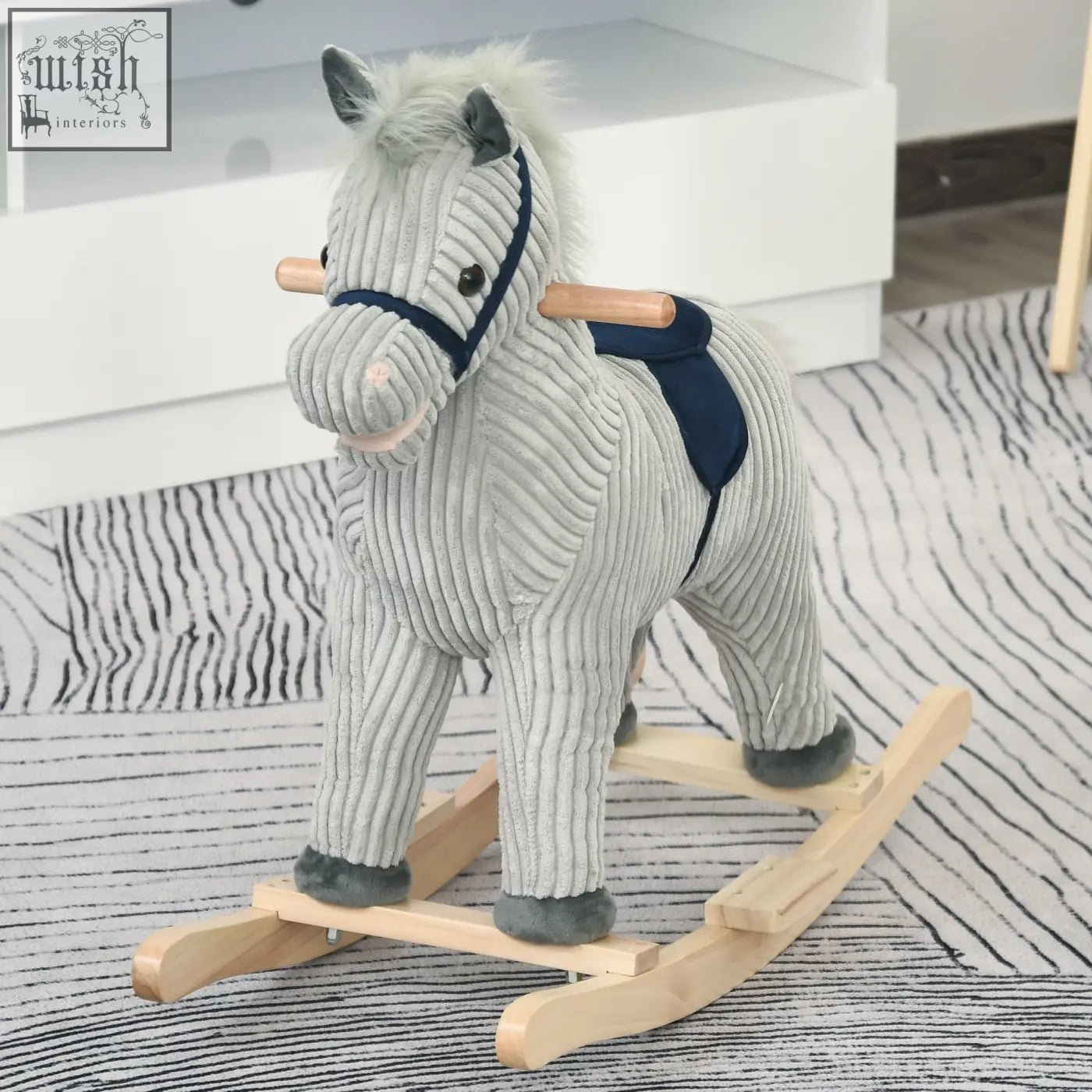 Gray corduroy plush rocking horse with navy harness and wooden base featuring galloping sounds for kids 3-6 years