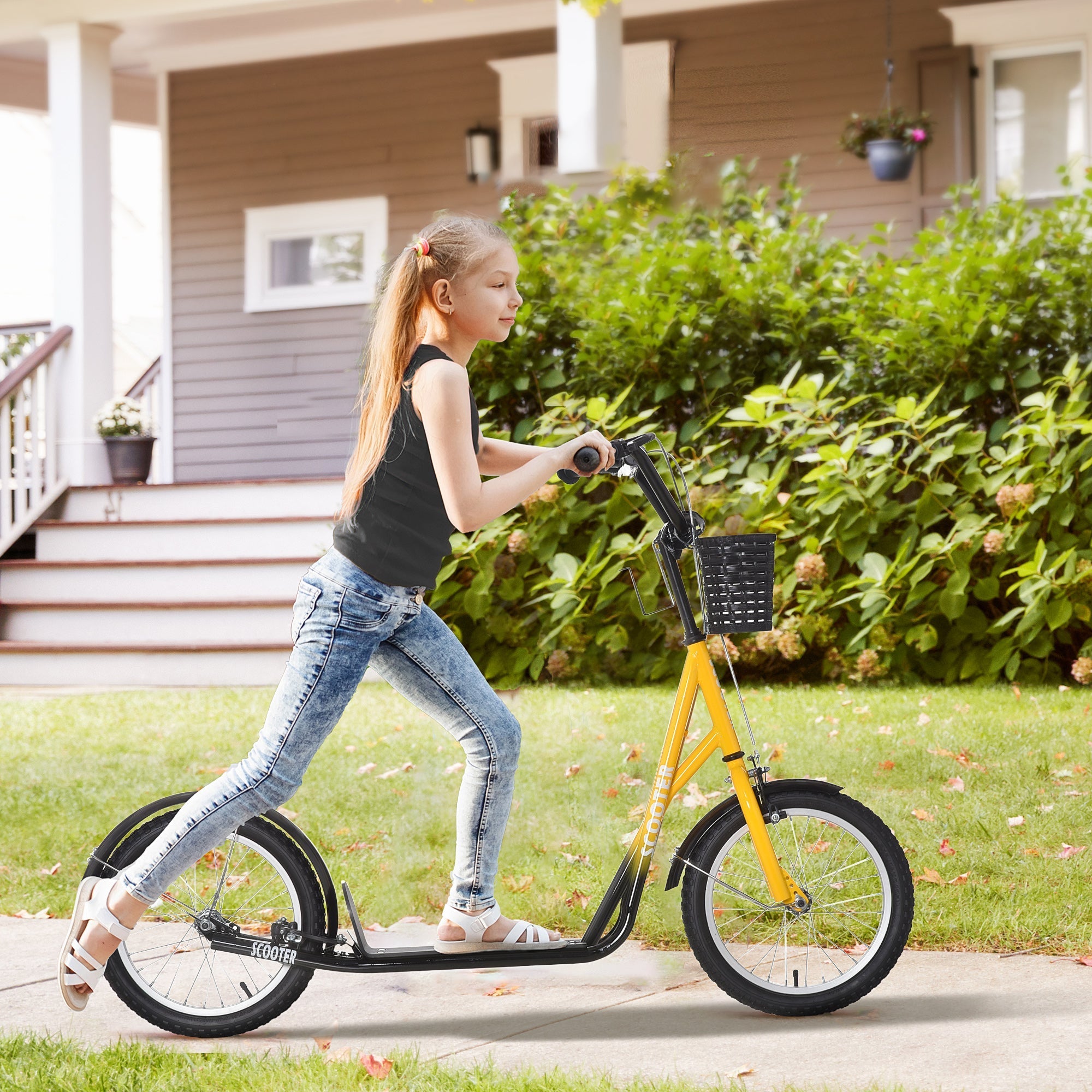 Yellow and black kooba kids scooter with adjustable handlebar dual braking front basket and wide foot deck