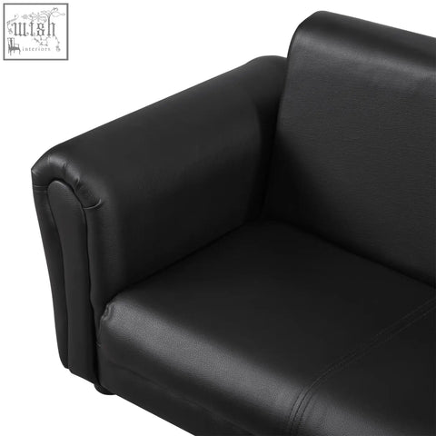 Black faux leather kids twin sofa with sleek modern design and matching footstool for boys and girls with high weight capacity