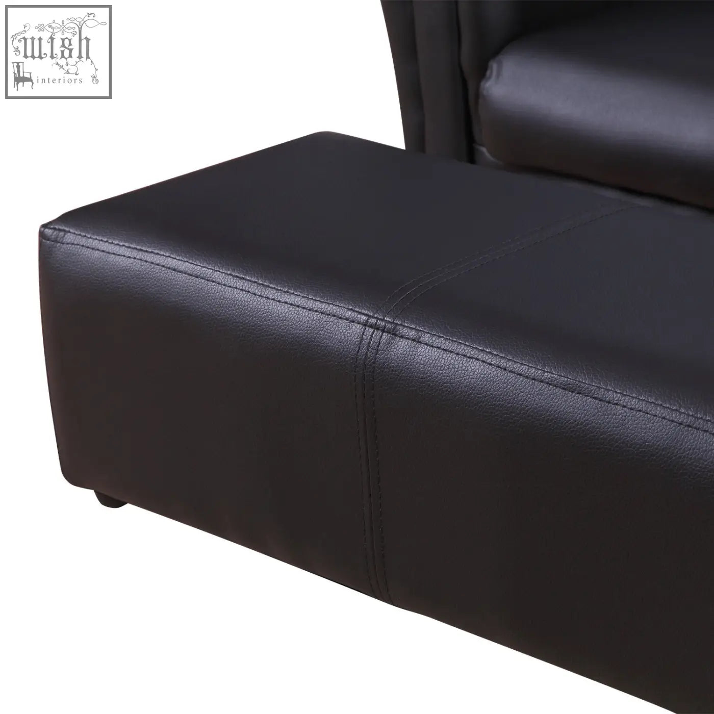 Black faux leather kids twin sofa with stitched seams rounded edges and matching footstool has sturdy weight capacity