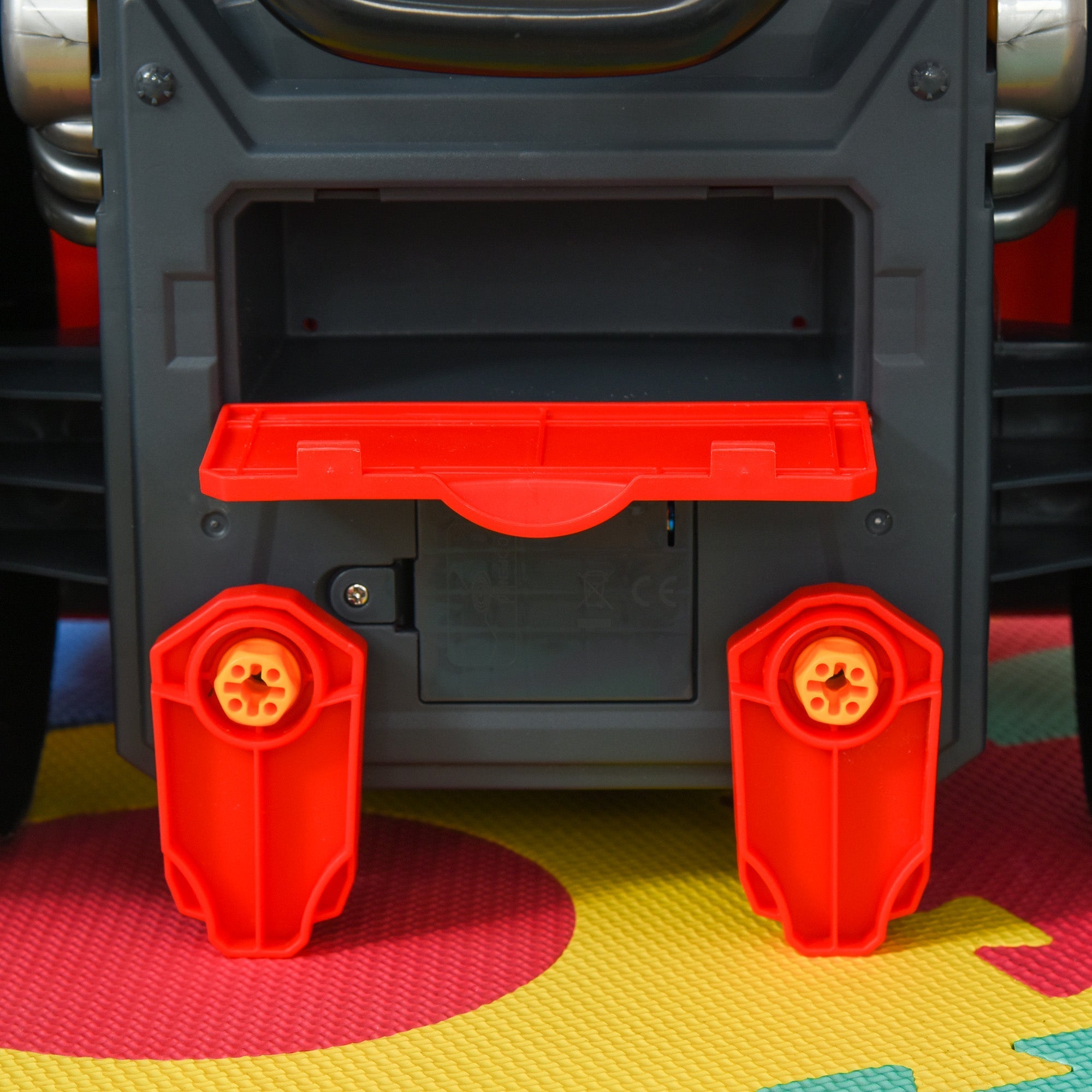Red plastic bumper guards with orange hubs in homcom kids truck engine toy set with rc car key and steering wheel