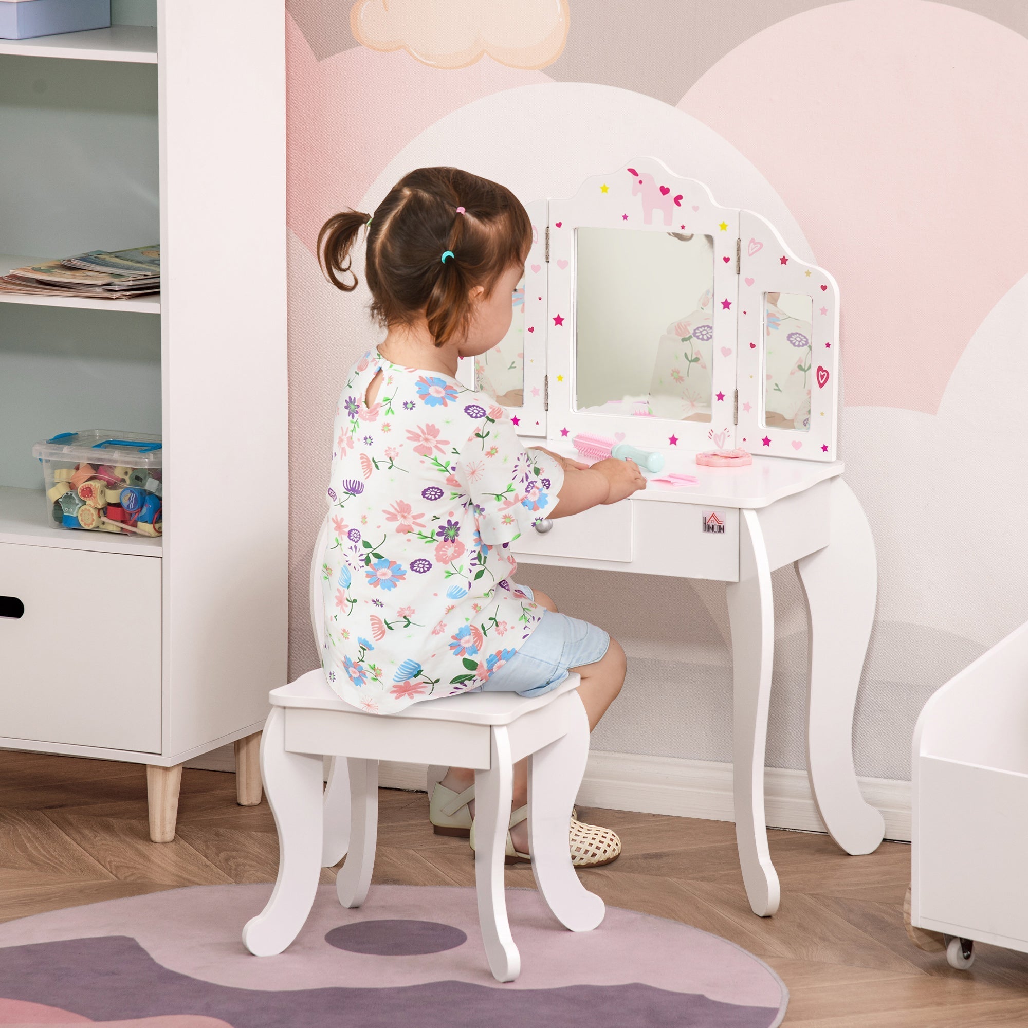 White wooden kids vanity table with three-panel rotatable mirror and pink purple star decals for girls play set