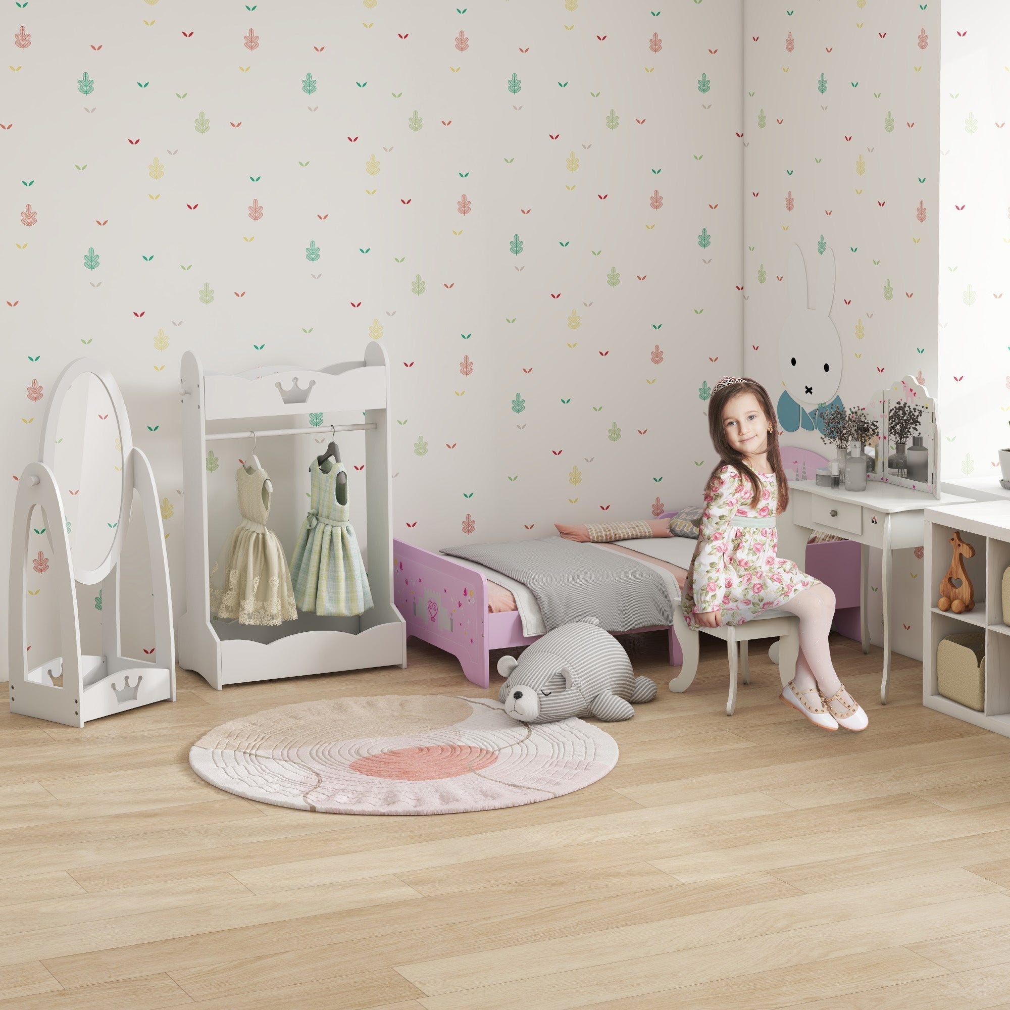 A child sits on a white stool in a pink princess bedroom using the homcom kids vanity table with rotatable mirrors and drawer