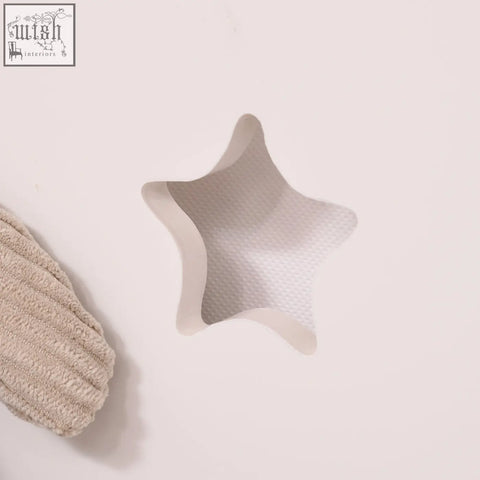 Beige textured star-shaped wooden toy box wall shelf with embossed pattern perfect for kids storage box use