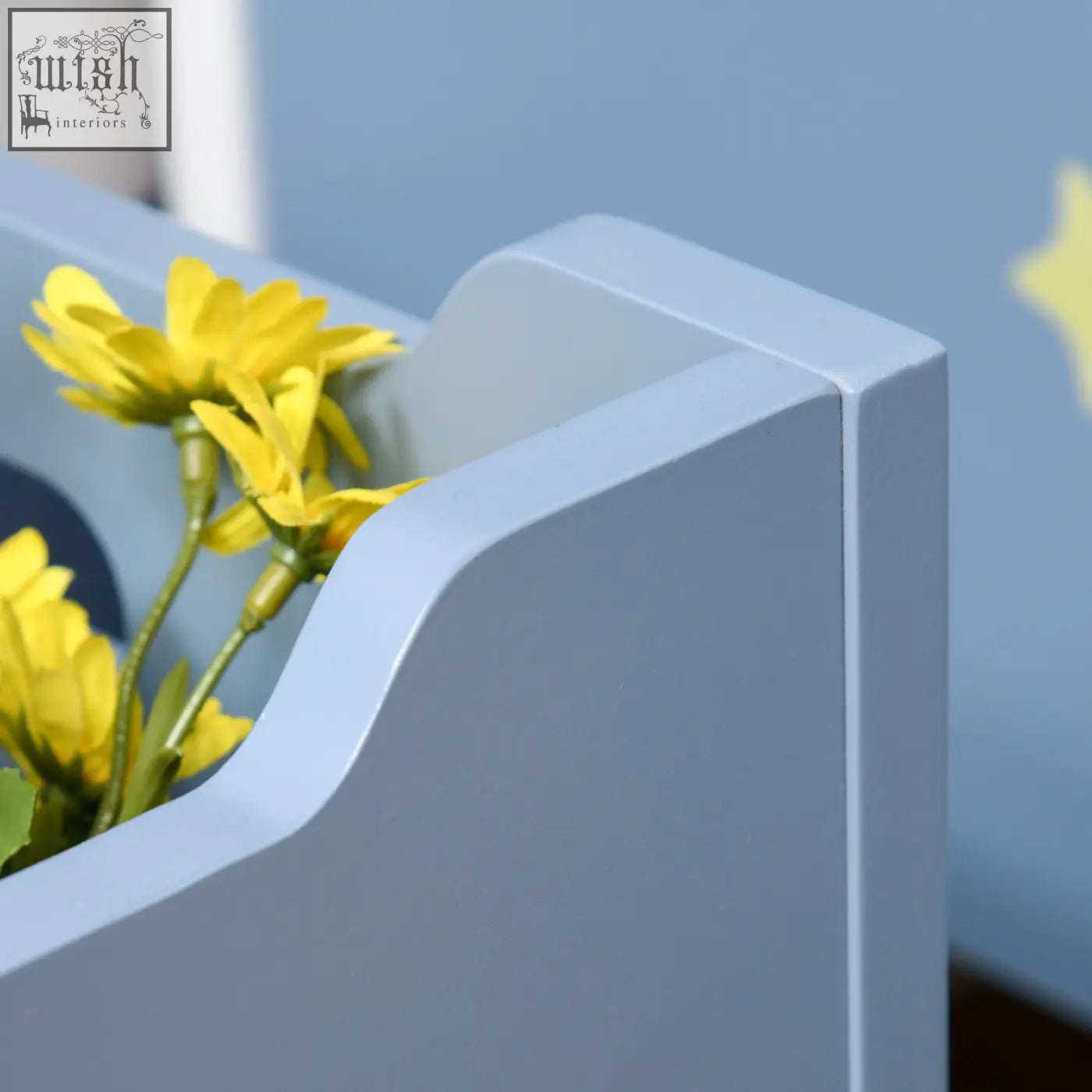 Blue homcom wooden toy box with gas hinge holding light blue planter with yellow artificial daisies