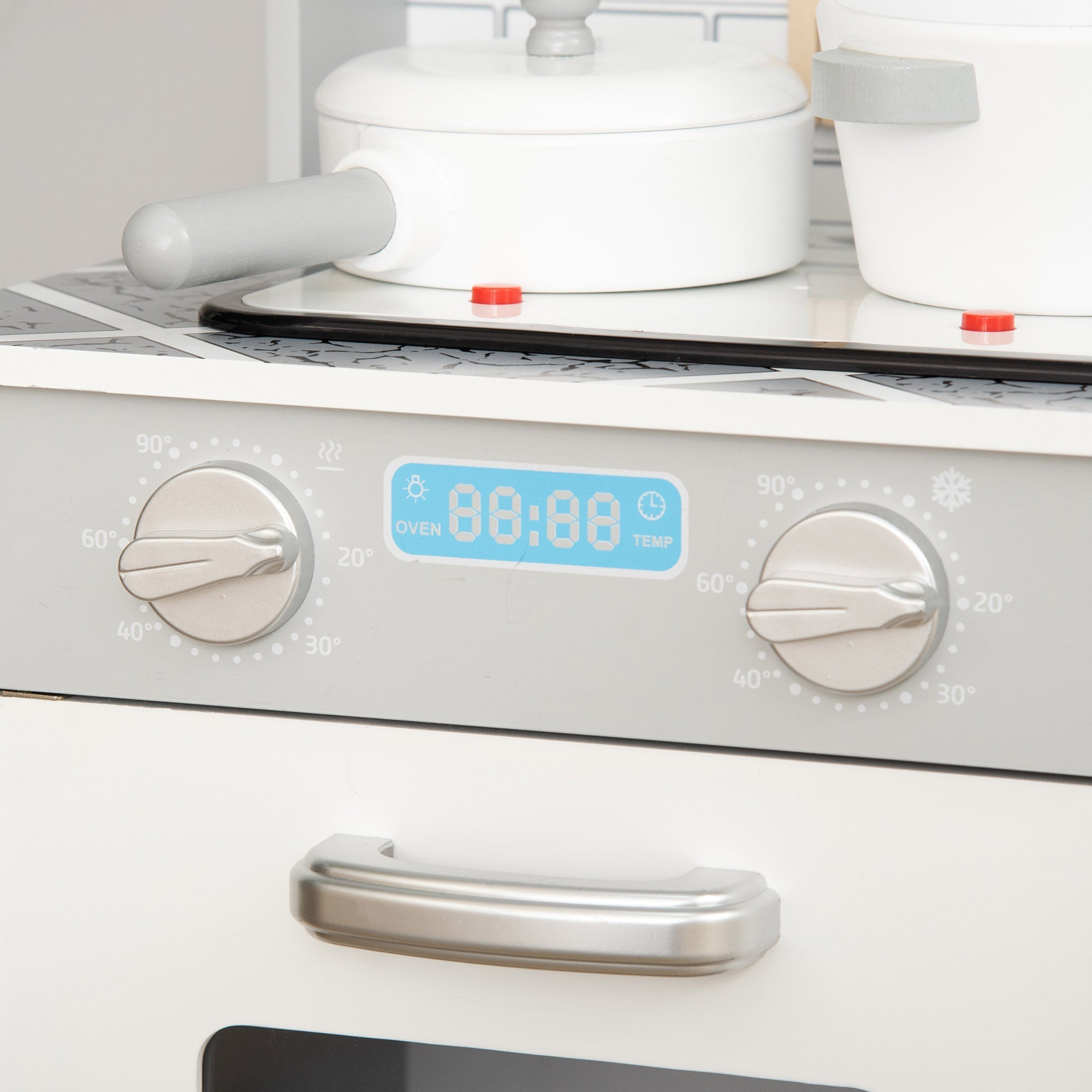 White toy oven with silver knobs and digital display in homcom kids wooden kitchen playset with ice machine and wooden kitchen accessories