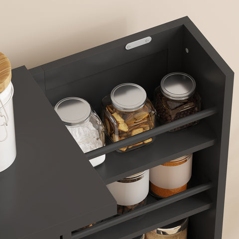 Black metal kitchen cupboard with adjustable shelves holding glass jars and white canisters for pantry storage