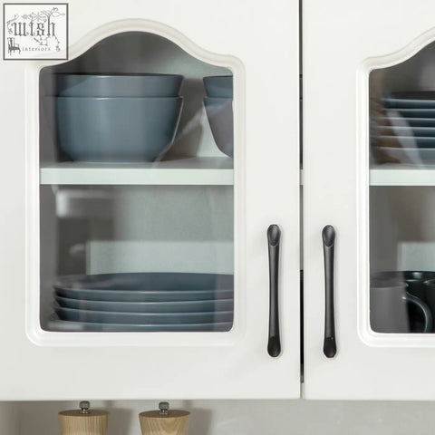 White homcom kitchen cupboard with arched glass doors, two drawers, and gray ceramic bowls inside storage cabinet
