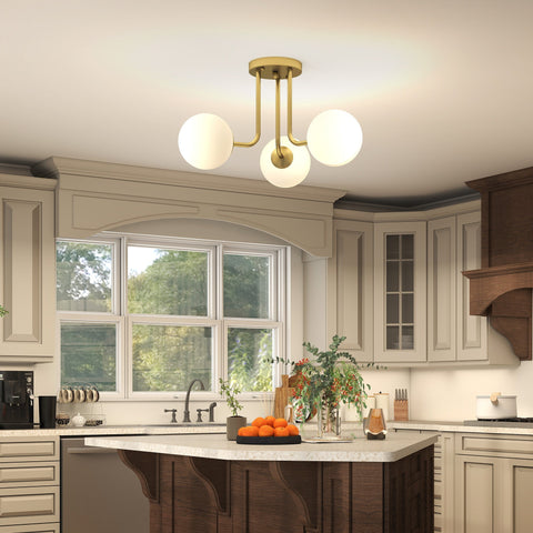 Brass-finished led ceiling light with three frosted globe shades modern design for living room or bedroom