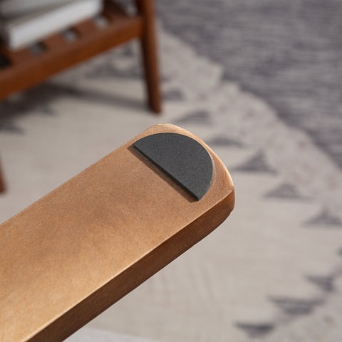 Matte black rubber pad on the rounded wooden base edge of homcom linen look recliner chair in light grey