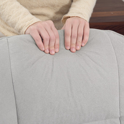 Light grey linen-look upholstery recliner chair cushion with visible stitching and wooden bases for living room