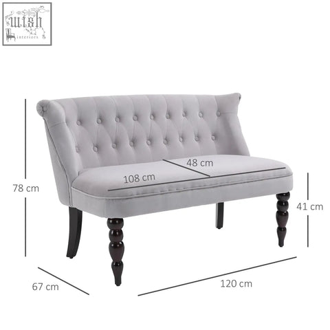 Gray velvet-feel loveseat with button tufted seat and carved legs perfect for bedroom or living room use
