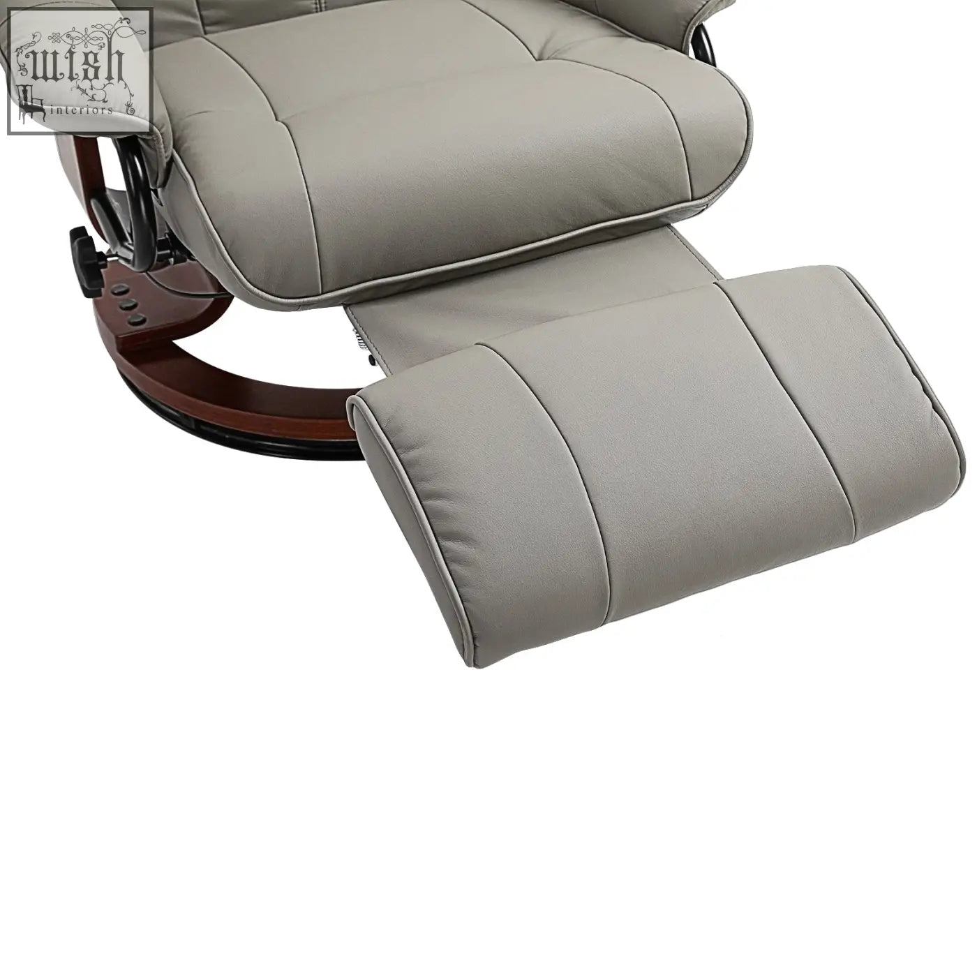 Gray faux leather manual recliner chair with matching footrest and dark wood base for living room or bedroom