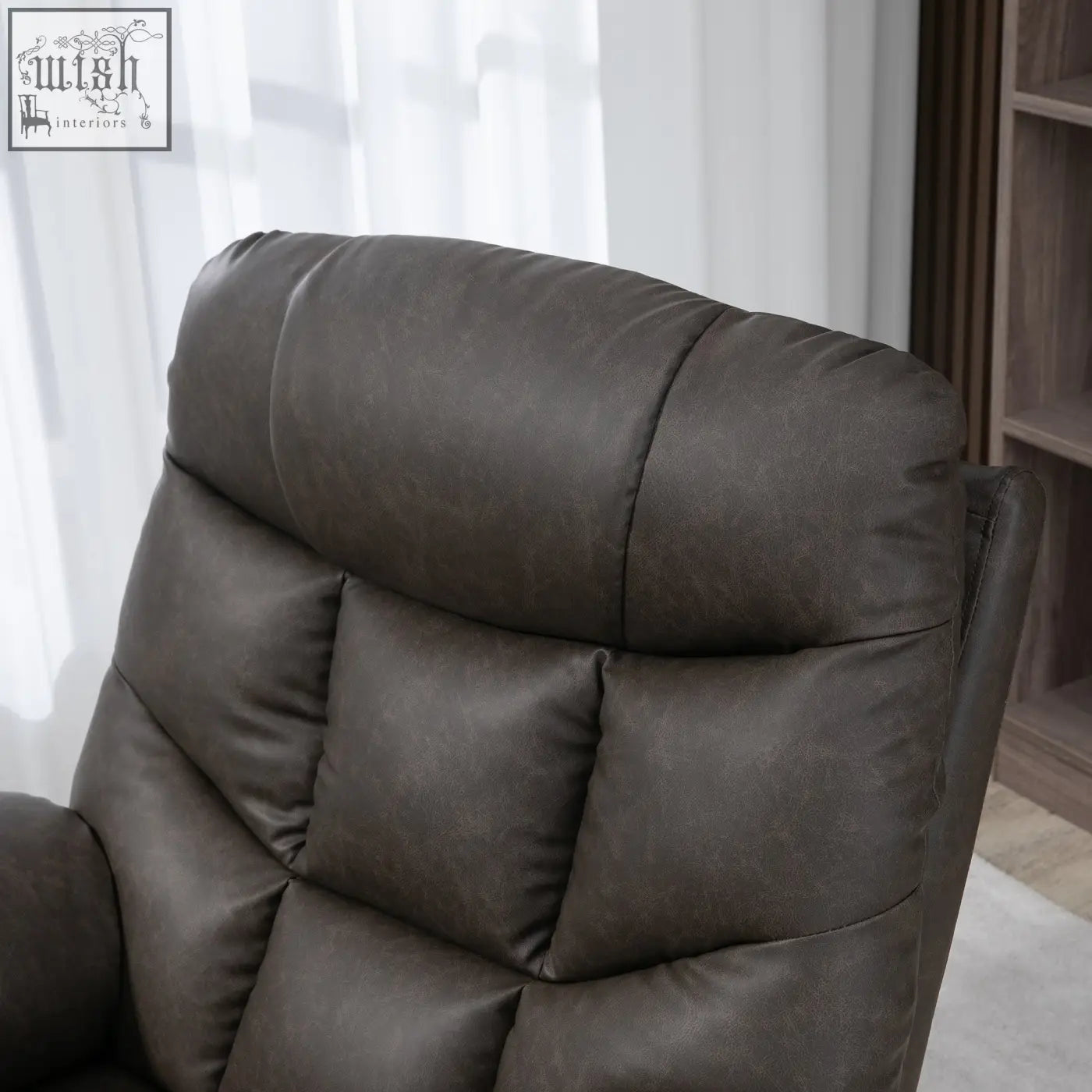 Dark brown faux leather recliner chair with quilted backrest and two cup holders perfect for relaxing at home