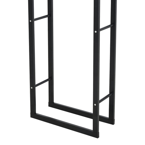 Black metal log holder with sturdy ladder design allows wood storage indoors and outdoors for fireplace use