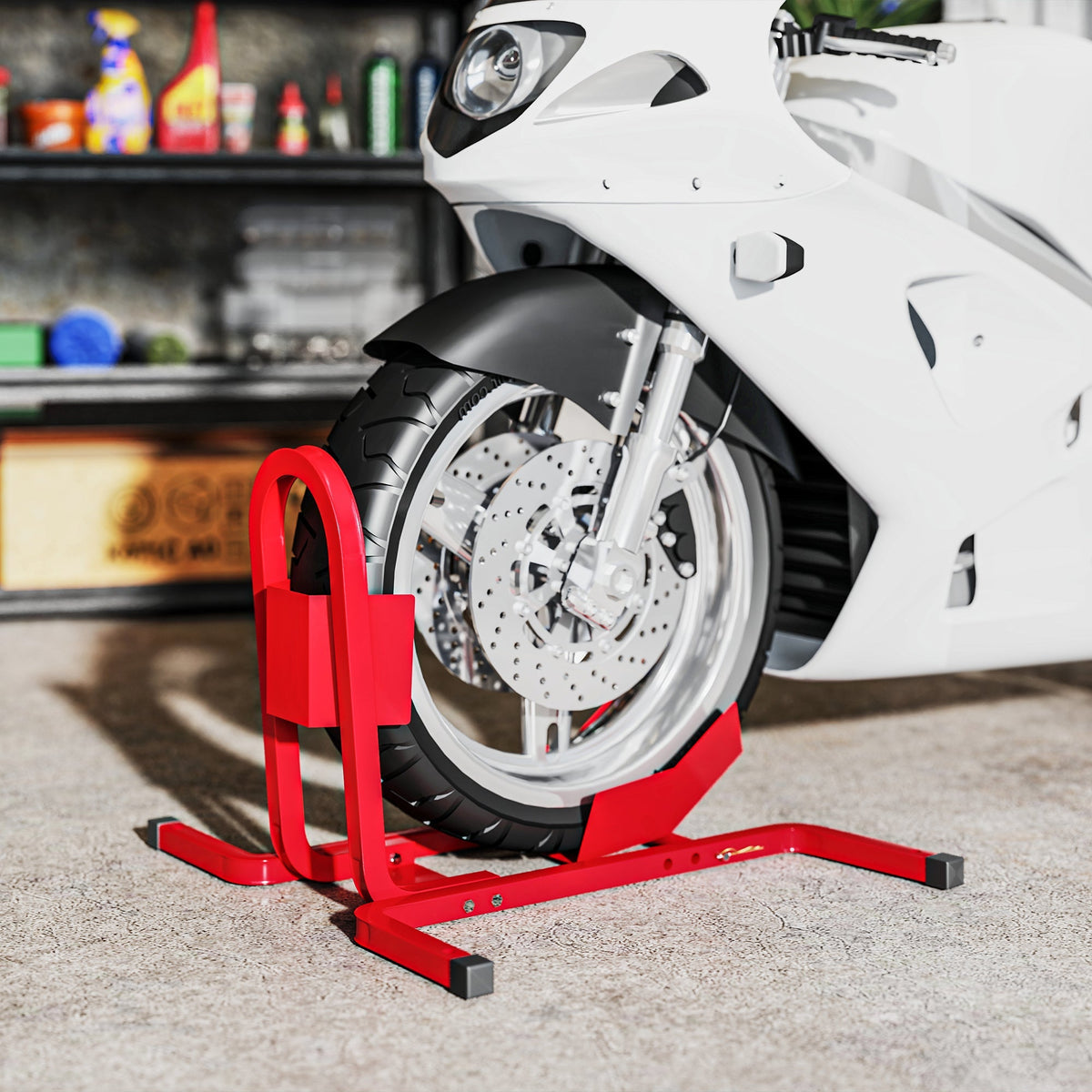Red metal HOMCOM wheel chock made of steel with extra strength and pre-drilled holes holding a white sport bike front wheel