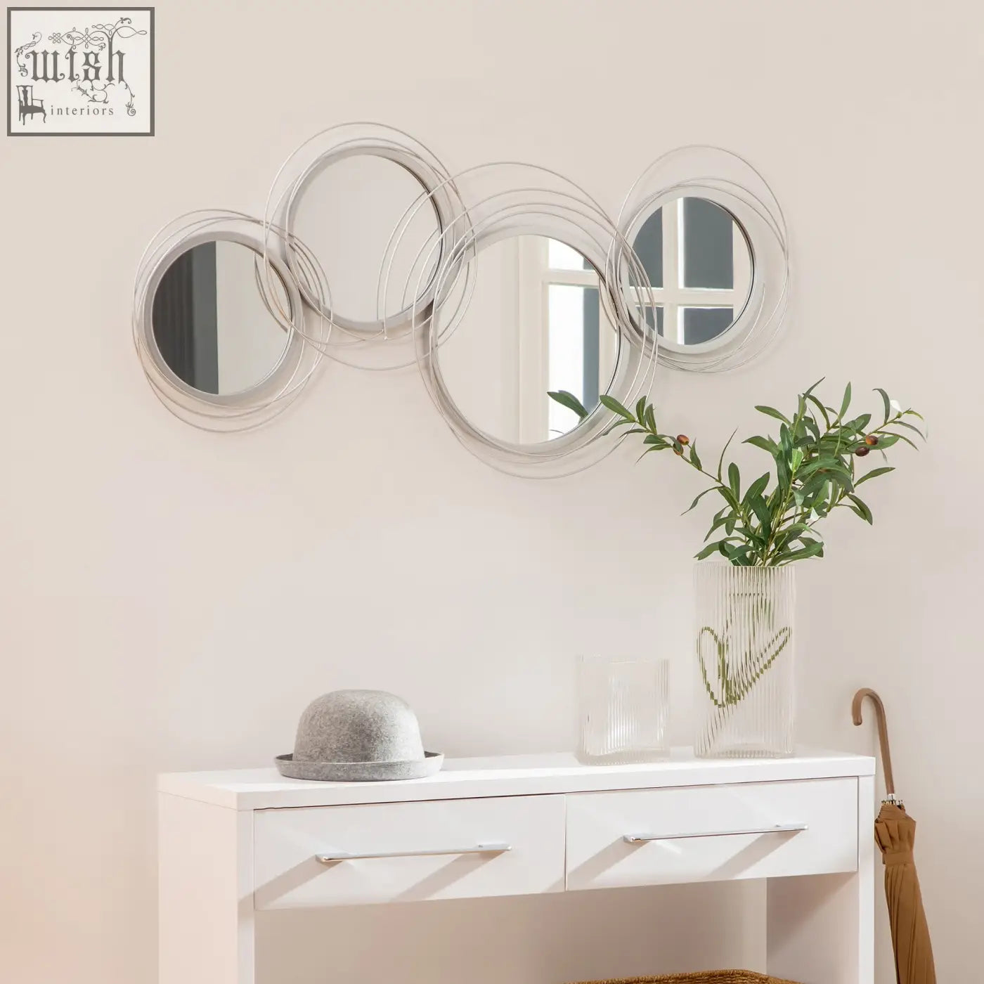 Silver framed metal wall art with circular overlapping mirrors hanging kit perfect for living room decor