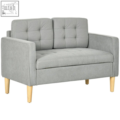 Gray tufted cotton couch with light grey fabric and wooden legs ensure durability in this modern 2 seater sofa