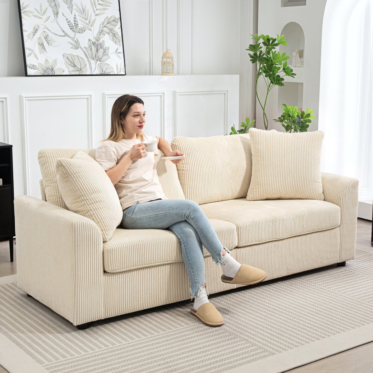Beige corduroy 3 seater sofa with spring pack and scatter cushions perfect for living room or home office