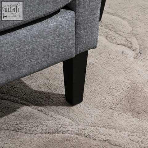 Gray textured fabric occasional chair with black rubber wood tapered legs for a comfy sitting experience