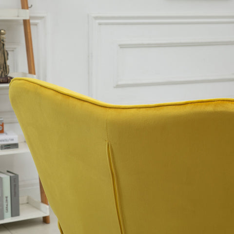 Back view of vibrant yellow velvet tufted wingback chair with wooden legs for stylish living room seating
