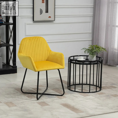 Vibrant yellow velvet-feel upholstered armchair with ribbed back and black metal base for living room use