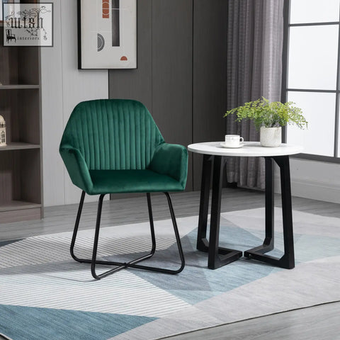 Emerald green velvet-feel upholstery armchair with ribbed back and black metal base for living room use