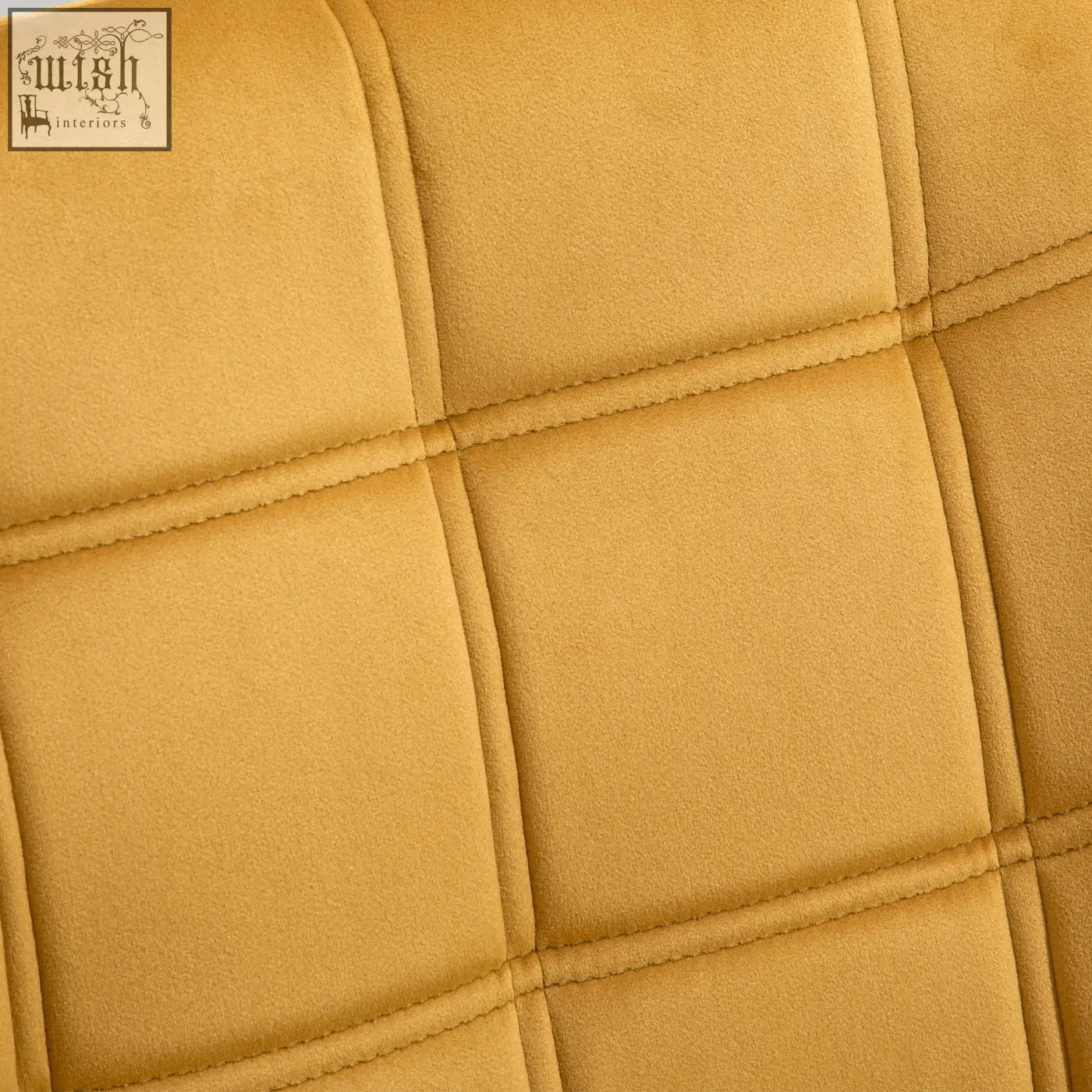 Mustard yellow velvet-feel upholstery with quilted stitching on a homcom modern armchair with wide arms and rubber wood legs