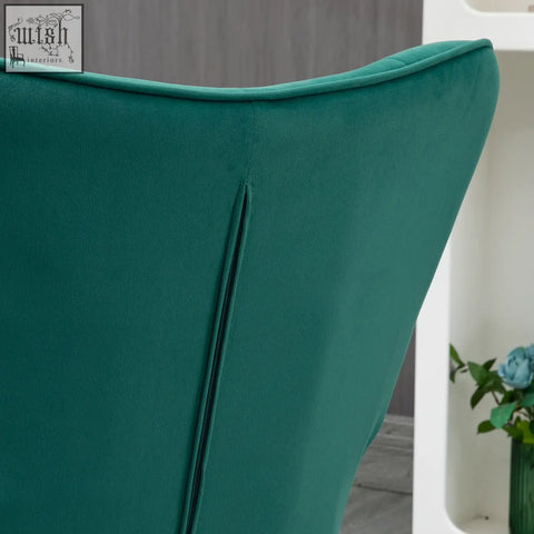 Back of dark green emerald velvet wingback chair with subtle seam zipper and steel legs from homcom armchair set