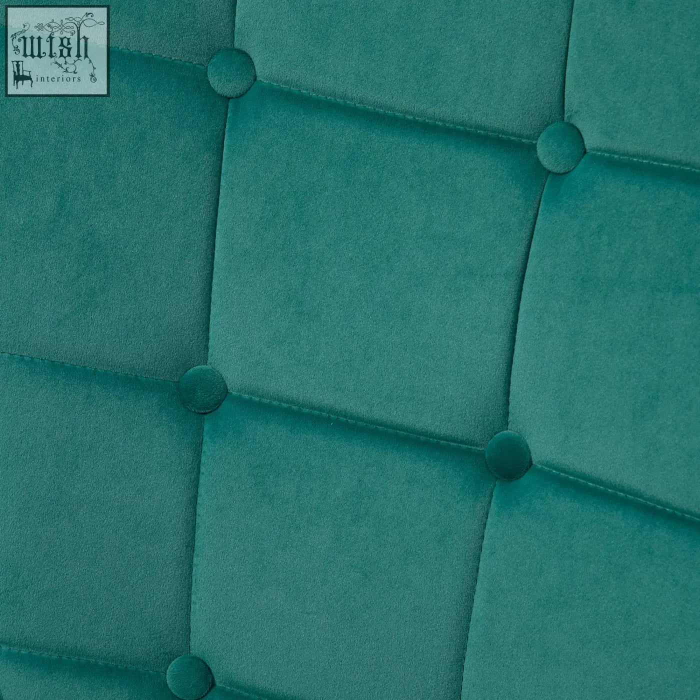 Teal velvet tufted headboard with button details on a homcom modern armchair with padded seat and steel legs