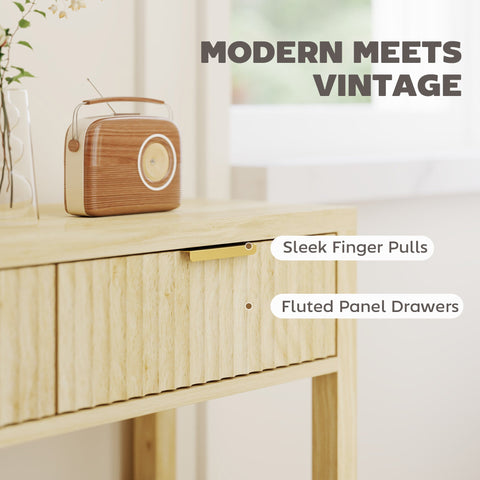Retro-style wooden and cream radio on a natural wood finish console table with fluted panel drawers for entryway use