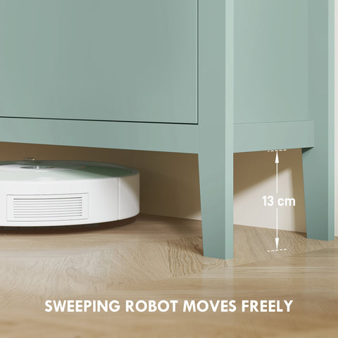 White circular robotic vacuum cleaner shown under a green HOMCOM modern shoe cabinet with four flip drawers