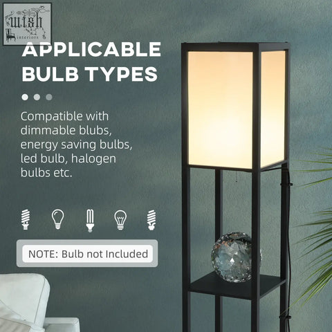Black metal shelf lamp with softly glowing rectangular shade and two middle shelves for living room or bedroom use