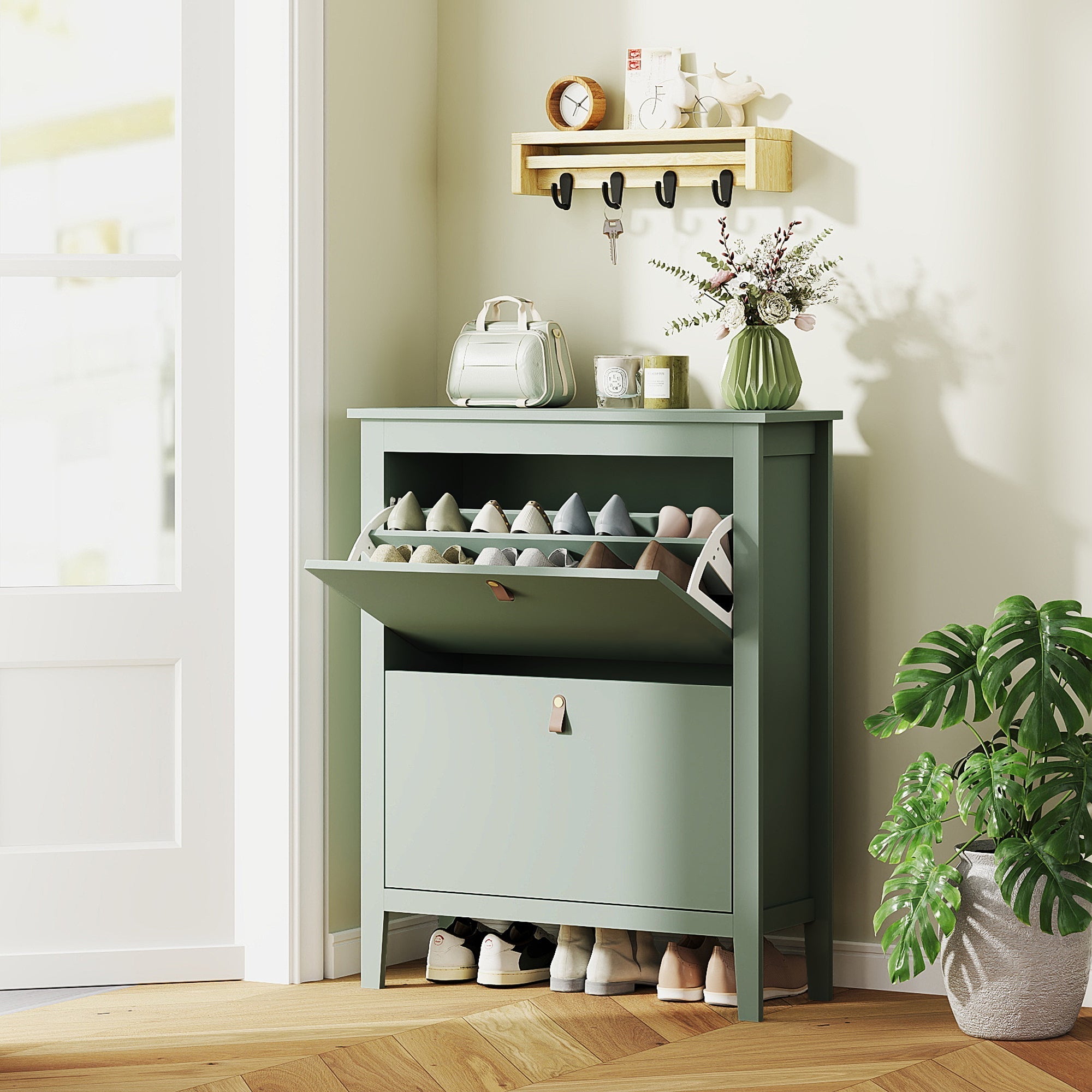 Mint green wooden shoe cabinet with two flip drawers, pull-out shelf, and black metal hooks by HOMCOM