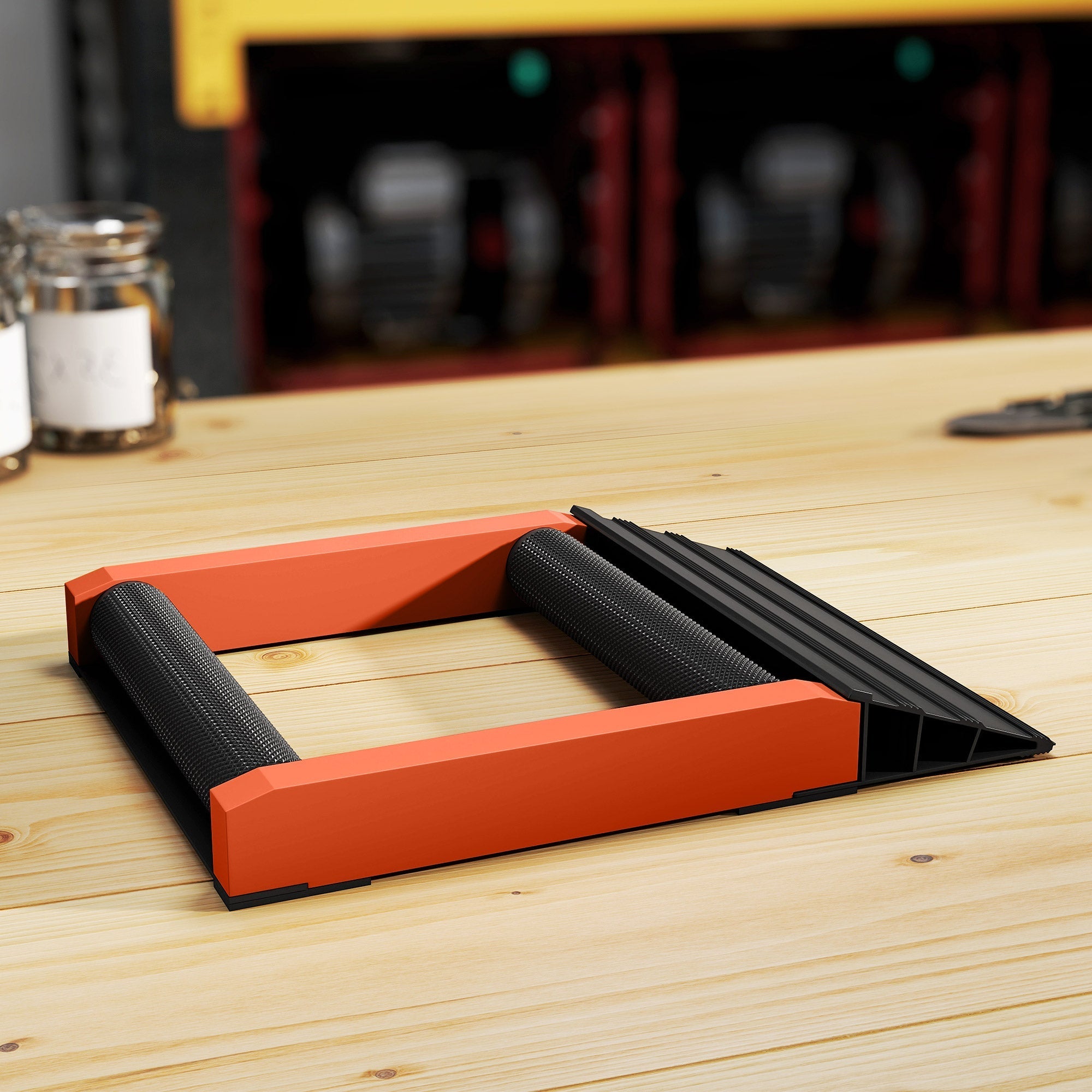 Orange and black plastic garage door opener ramp with textured grip on aluminium alloy frame for motorcycle wheel cleaning