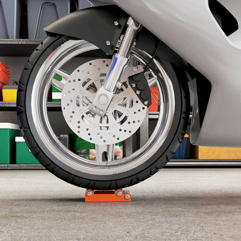 Orange metal wheel chock under motorcycle tire on homcom roller stand with steel frame for wheel cleaning and maintenance