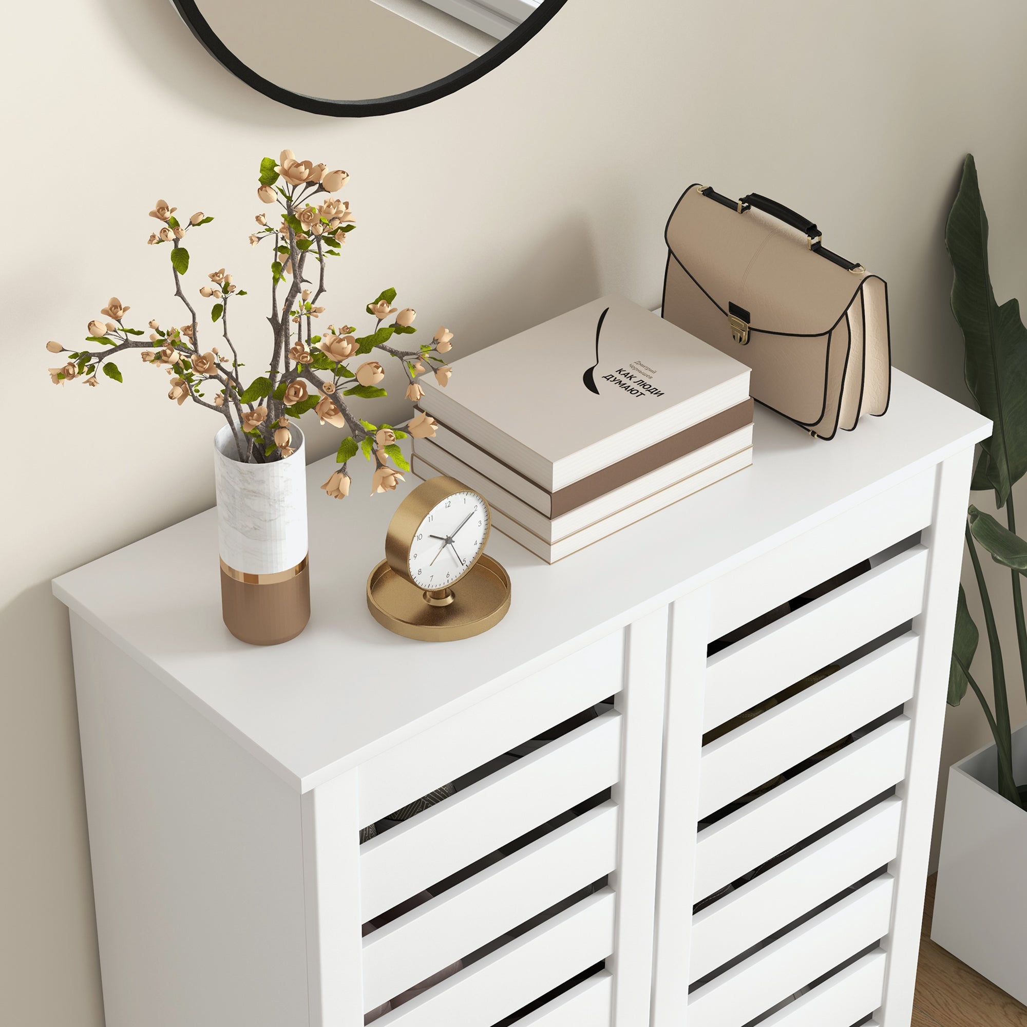 White HOMCOM narrow shoe cabinet with black trim featuring slatted doors and adjustable shelves for shoe storage