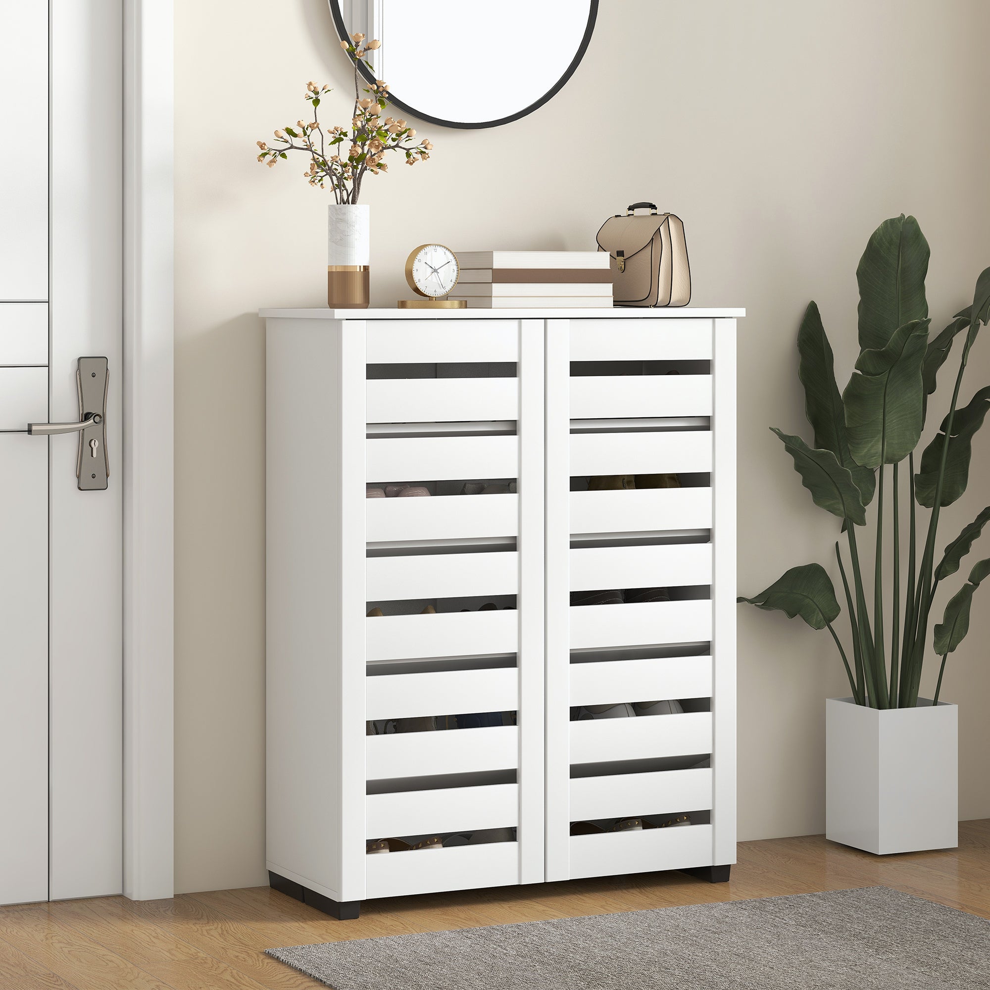 White narrow shoe cabinet with slatted doors and adjustable shelves for sleek shoe storage in entryway