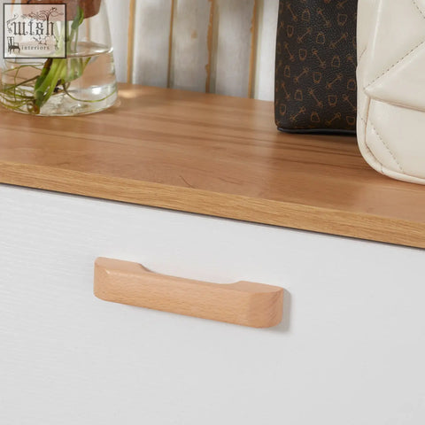 Light-colored wooden drawer handle on homcom slim white shoe storage cabinet with 3 flip drawers for hallway use