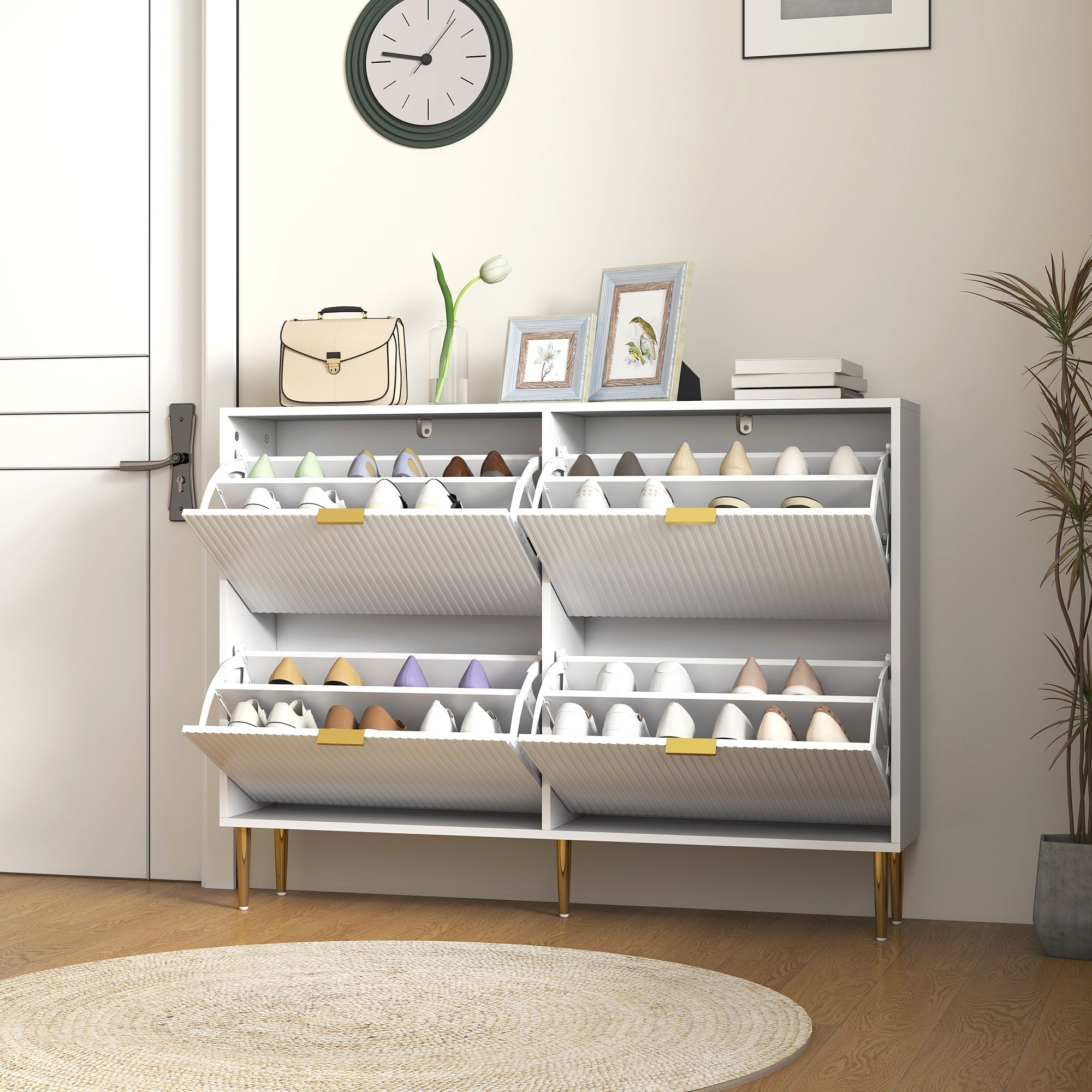 White HOMCOM narrow shoe cabinet with gold tone legs and pull-out compartments featuring fluted panel doors