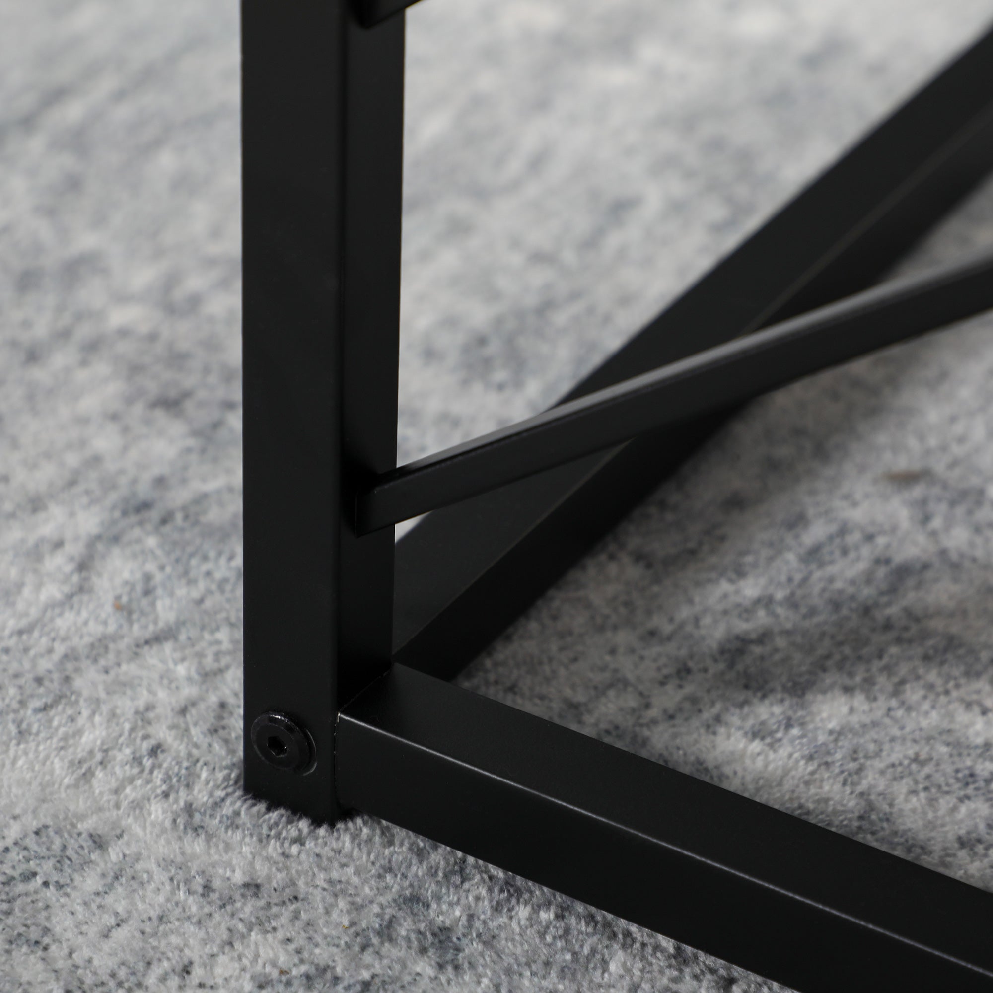 Black metal frame nesting coffee tables set of 3 with sleek angular design and matte finish for living room use