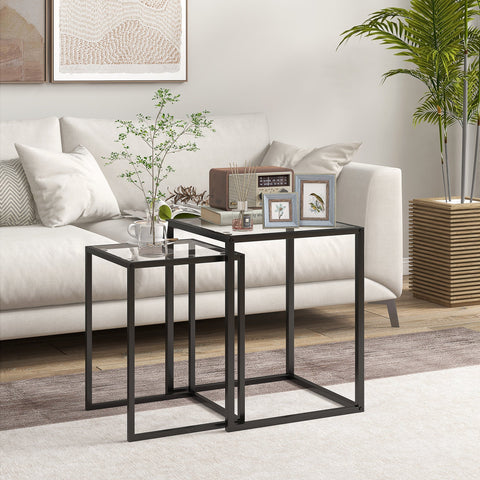 Modern black metal nesting tables set of 2 with tempered glass tops perfect for living room or bedroom use