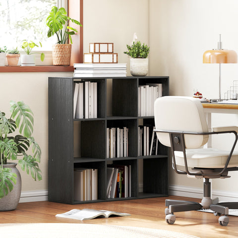 Black wood-grain particle board HOMCOM nine-cube storage shelf with nine open cubbies and books stacked on top