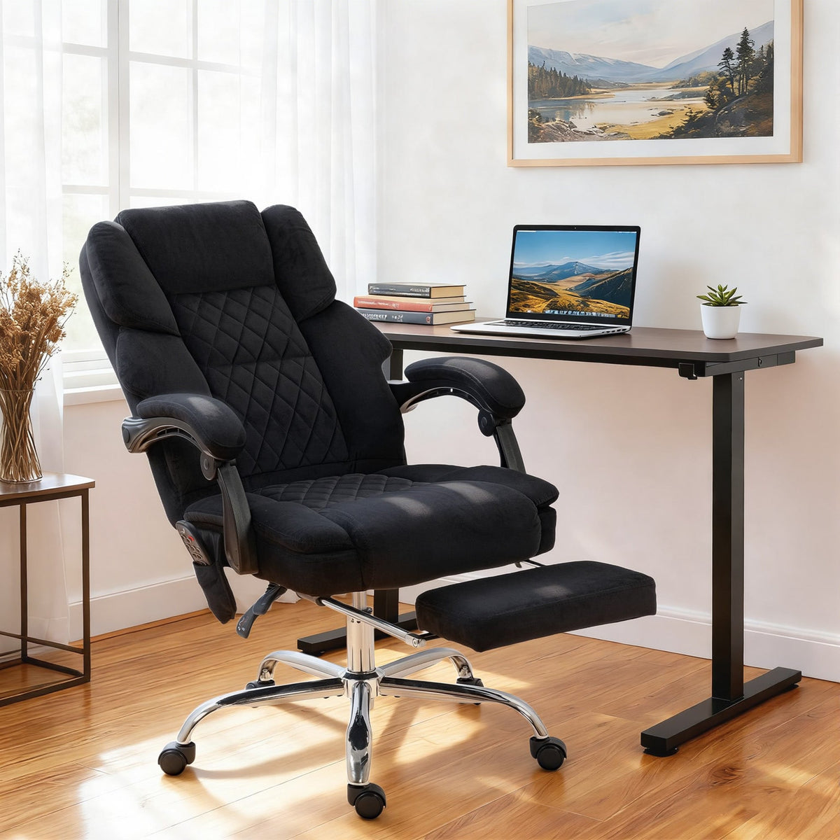 Black quilted fabric office chair with chrome base and casters featuring 6-point vibration massage and heat