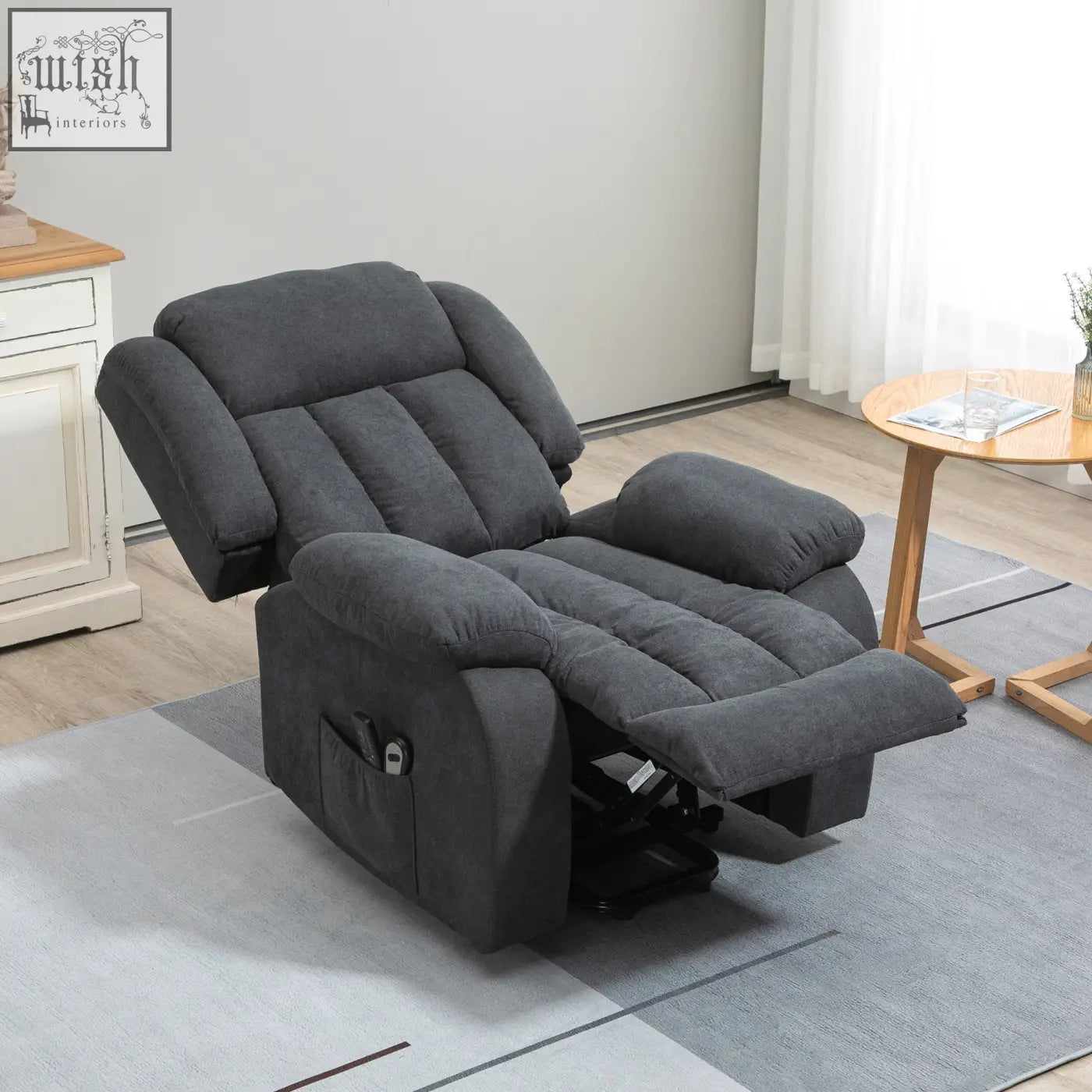 Dark gray fabric upholstered plush recliner with segmented cushioning eight massage points and built-in side pocket