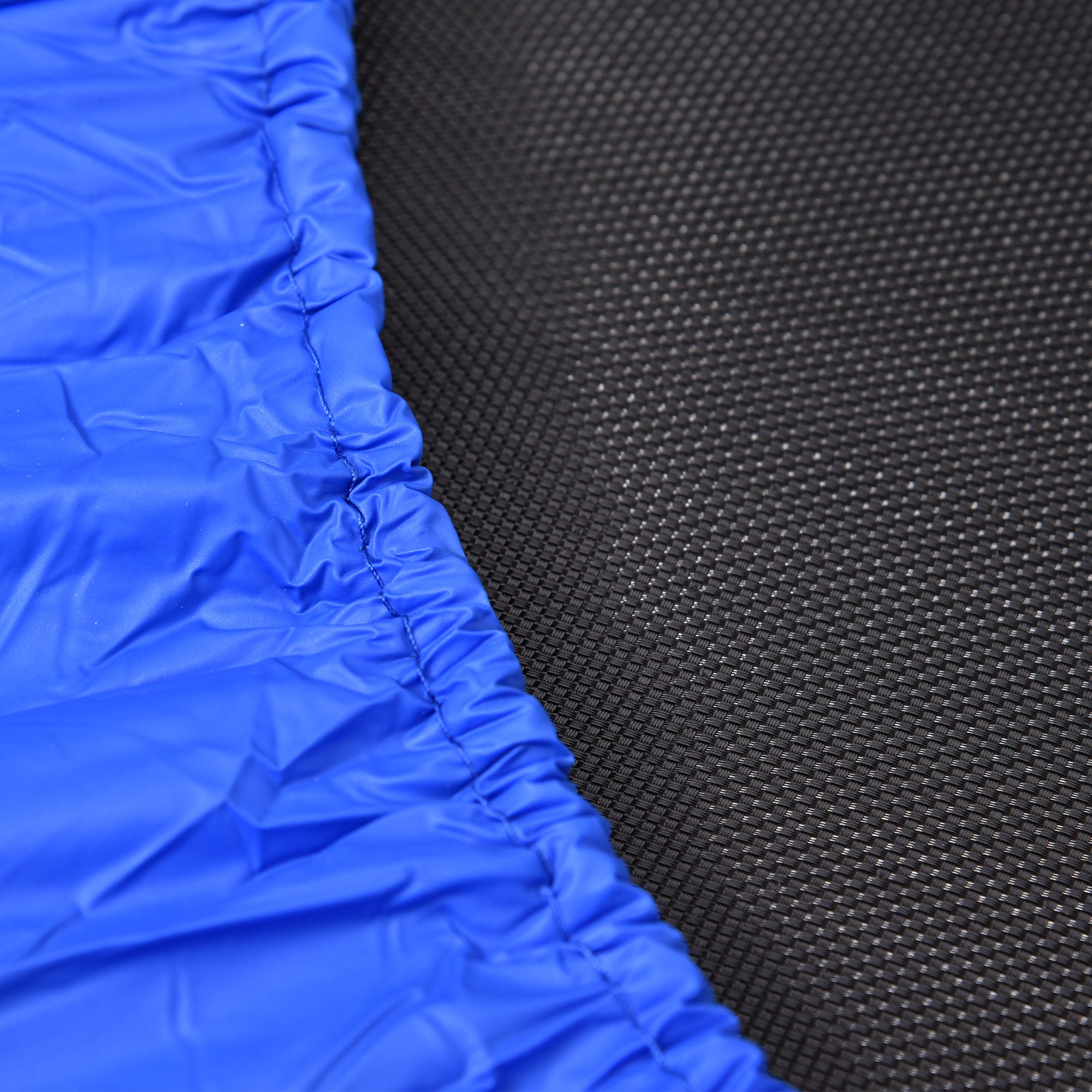 Blue fabric trim with ruched stitched edge borders black mesh on HOMCOM mini fitness trampoline metal frame